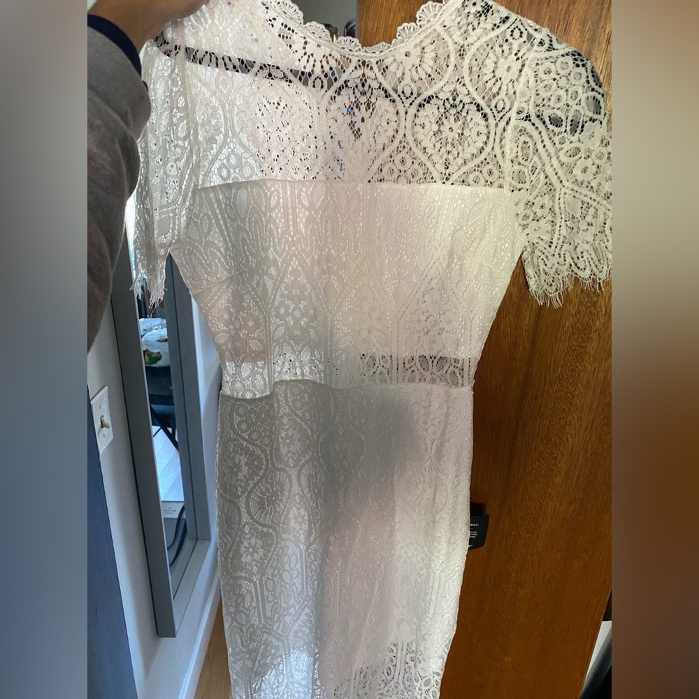 White mid length lulu dress. Great for wedding rehearsal or elopement!